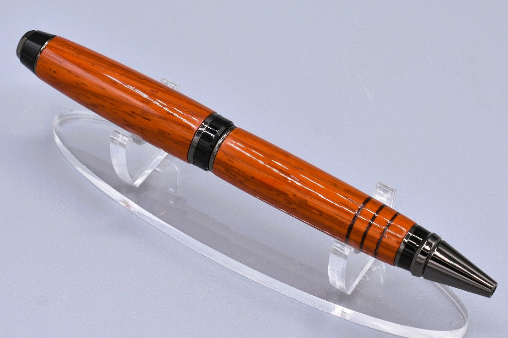 Handmade Cigar twist pen. Padauk wood.