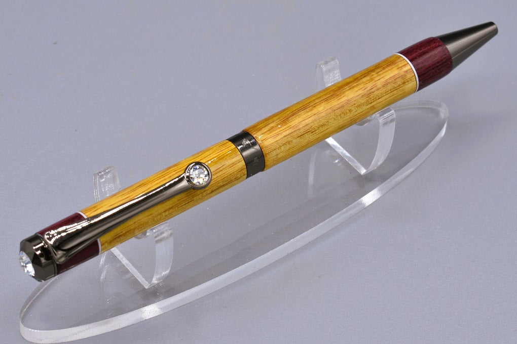 Handmade Diana twist pen. Canary and Purpleheart woods.