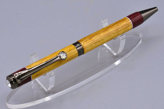 Handmade Diana twist pen. Canary and Purpleheart woods.