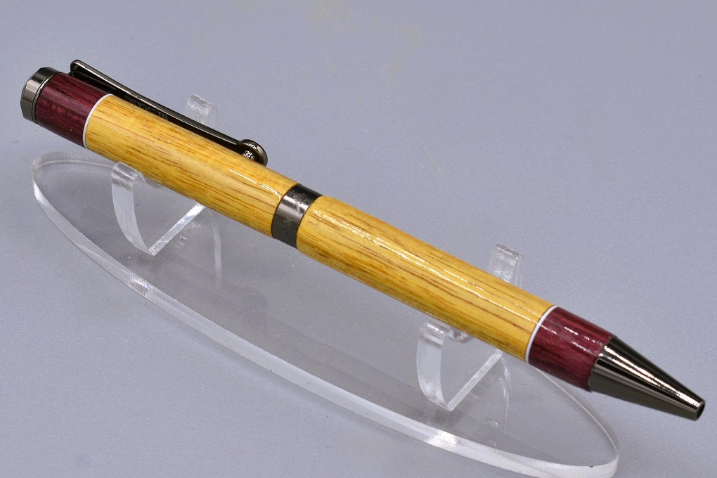 Handmade Diana twist pen. Canary and Purpleheart woods.