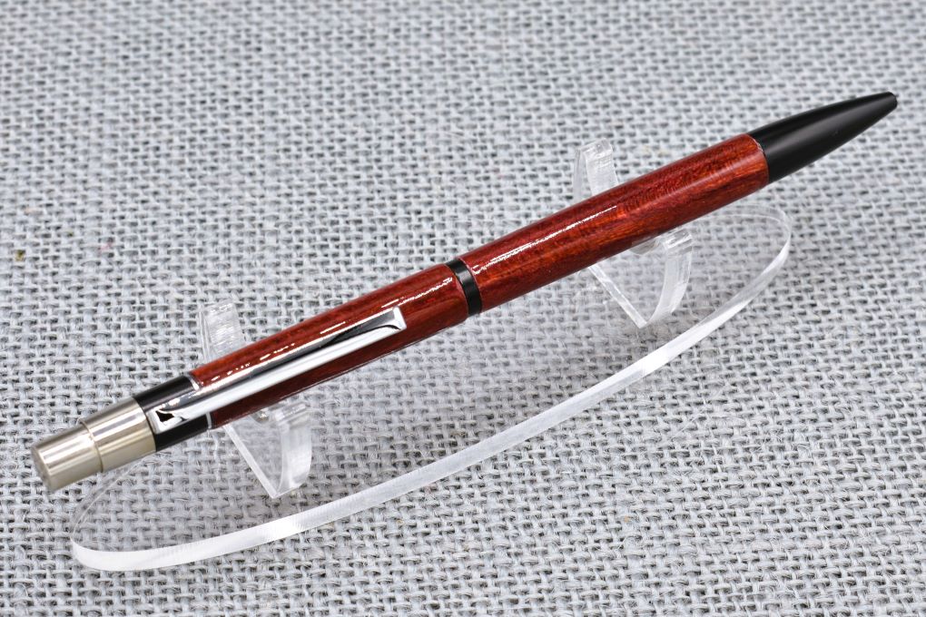 Handmade New Slim click pen. Dyed Mulberry wood.