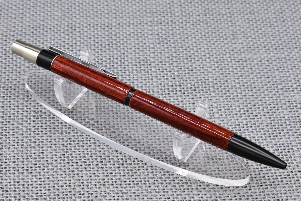 Handmade New Slim click pen. Dyed Mulberry wood.