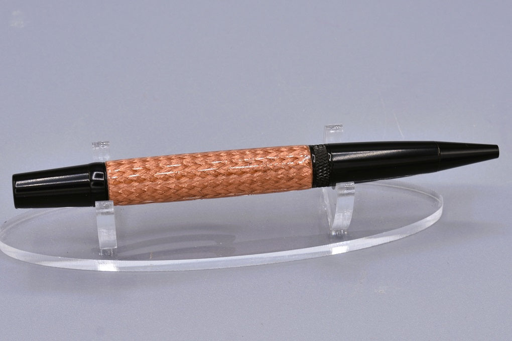 Handmade Knurl twist pen. Braided copper and resin.