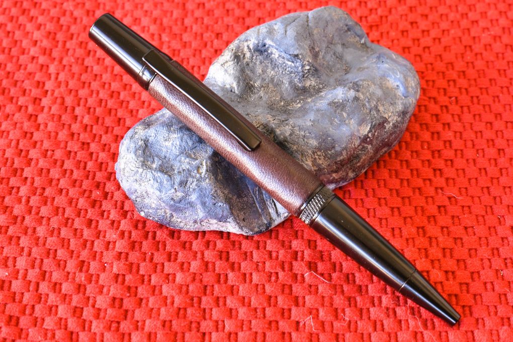 Handmade Knurl twist pen. Dark brown leather.