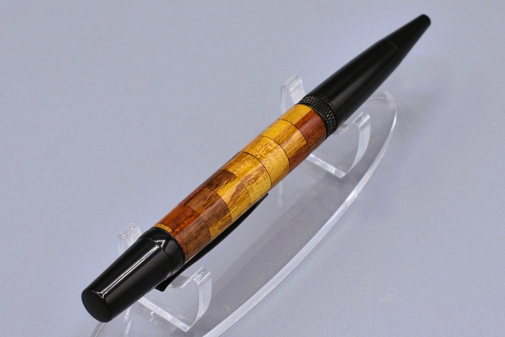 Handmade Knurl twist pen. Mulberry, Granadillo, Padauk woods.