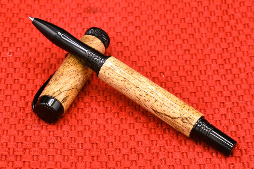 Handmade Knurl Rollerball pen. Spalted Mango wood.