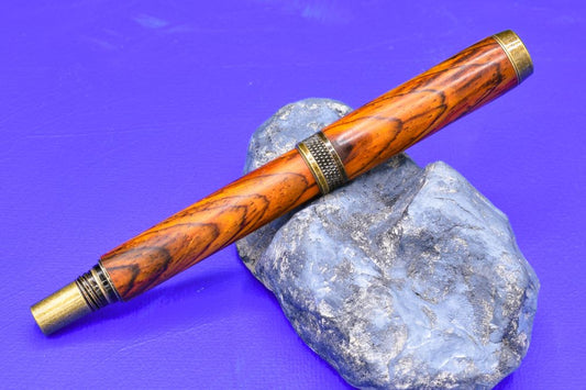 Handmade Knurl rollerball pen. Cocobolo wood.