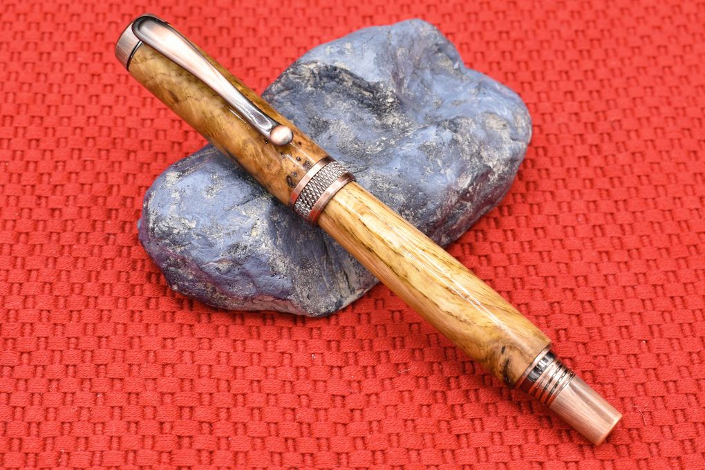 Handmade Knurl rollerball pen. Oak burl wood.