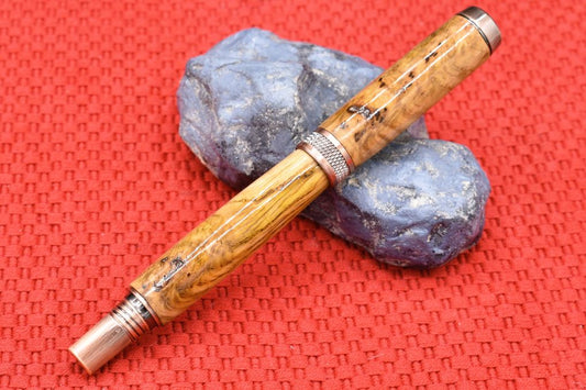 Handmade Knurl rollerball pen. Oak burl wood.