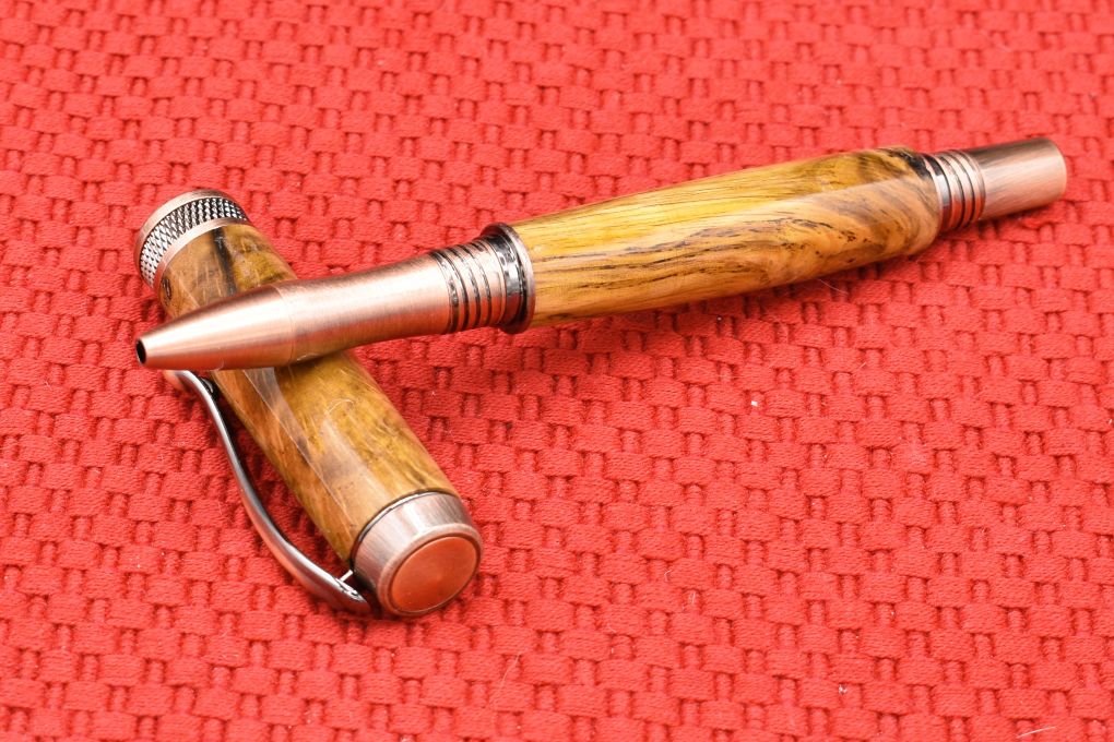 Handmade Knurl rollerball pen. Oak burl wood.