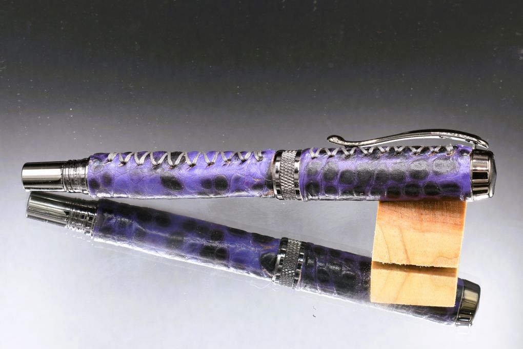 Handmade Knurl rollerball pen. Blue gator embossed leather.