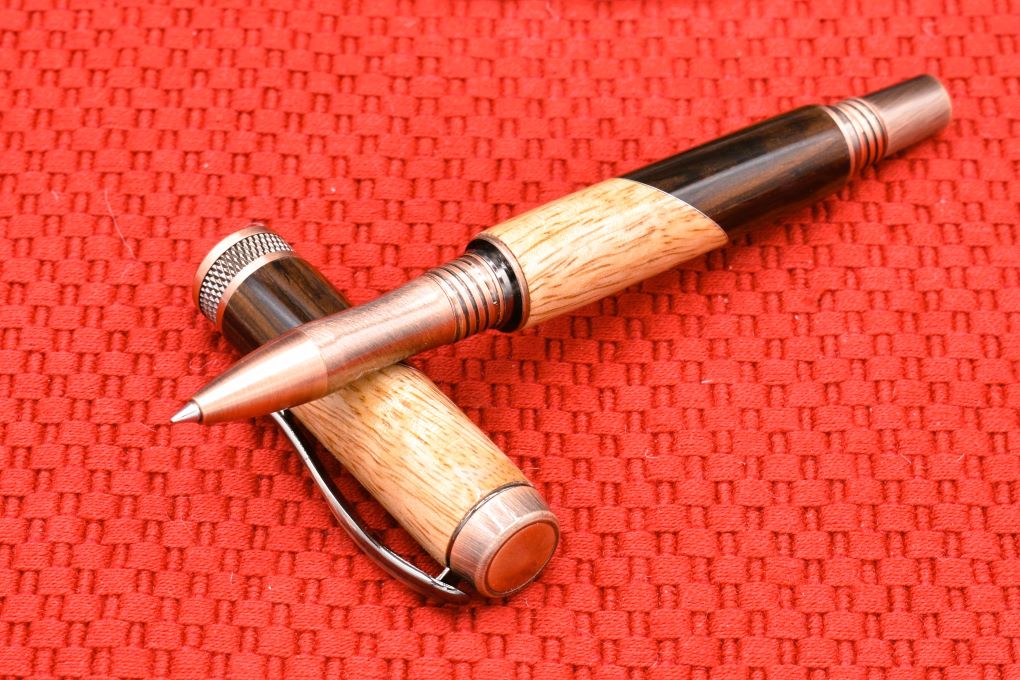 Handmade Knurl Rollerball pen. Cocobolo and curly Mango woods.