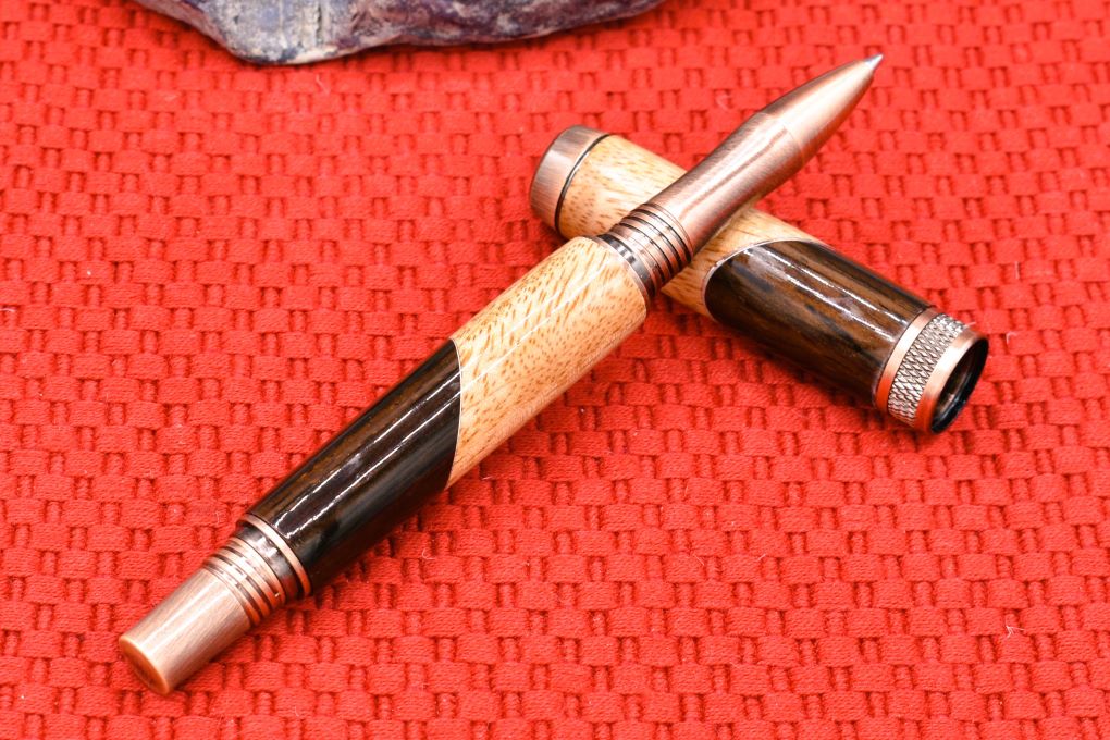 Handmade Knurl Rollerball pen. Cocobolo and curly Mango woods.