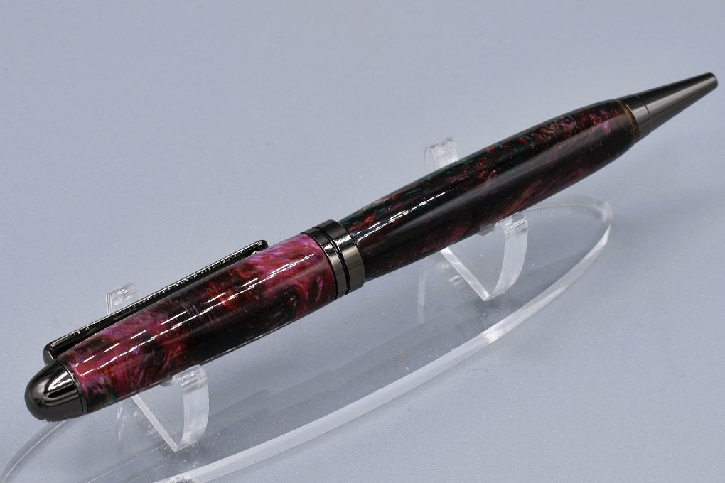 Handmade Round Top twist pen. Red, pink & green resin.