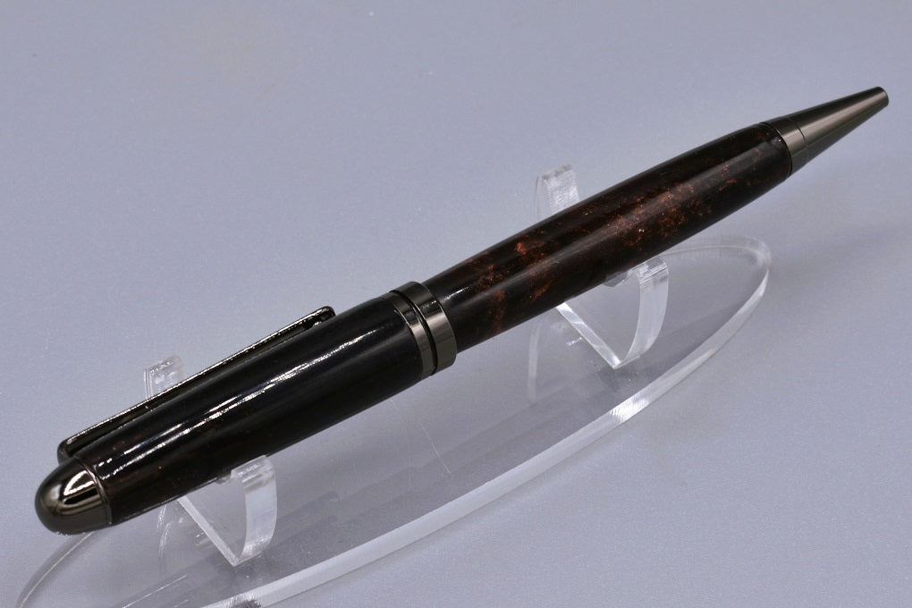 Handmade Round Top twist pen. Black & antique copper resin.