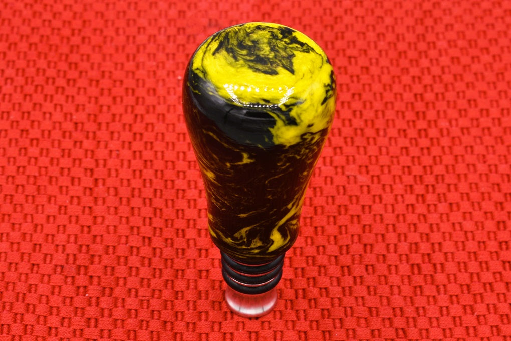 Handmade Bottle Stopper. Yellow and black resin.