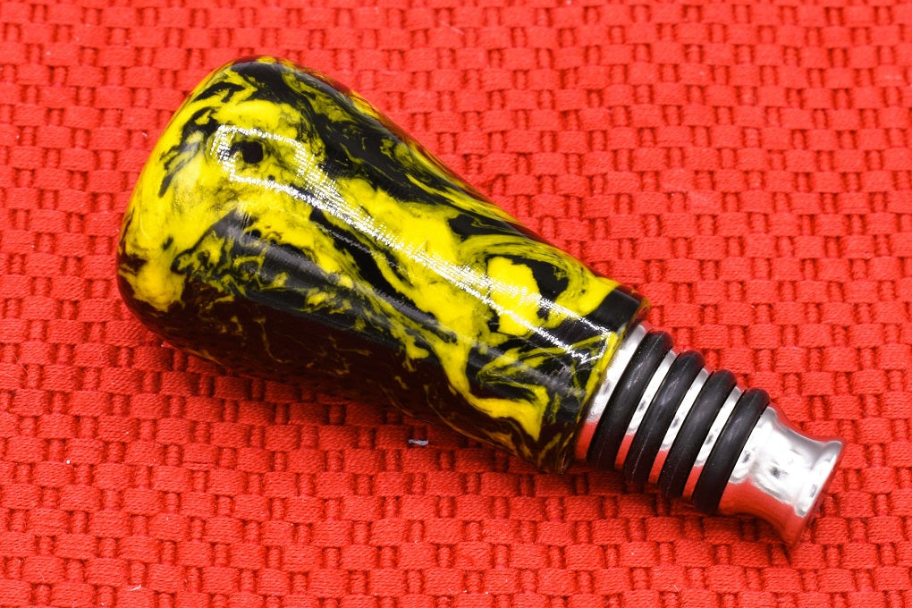 Handmade Bottle Stopper. Yellow and black resin.