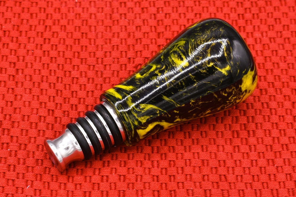 Handmade Bottle Stopper. Yellow and black resin.