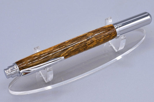 Handmade Chrome capped rollerball pen. Spalted Walnut wood.