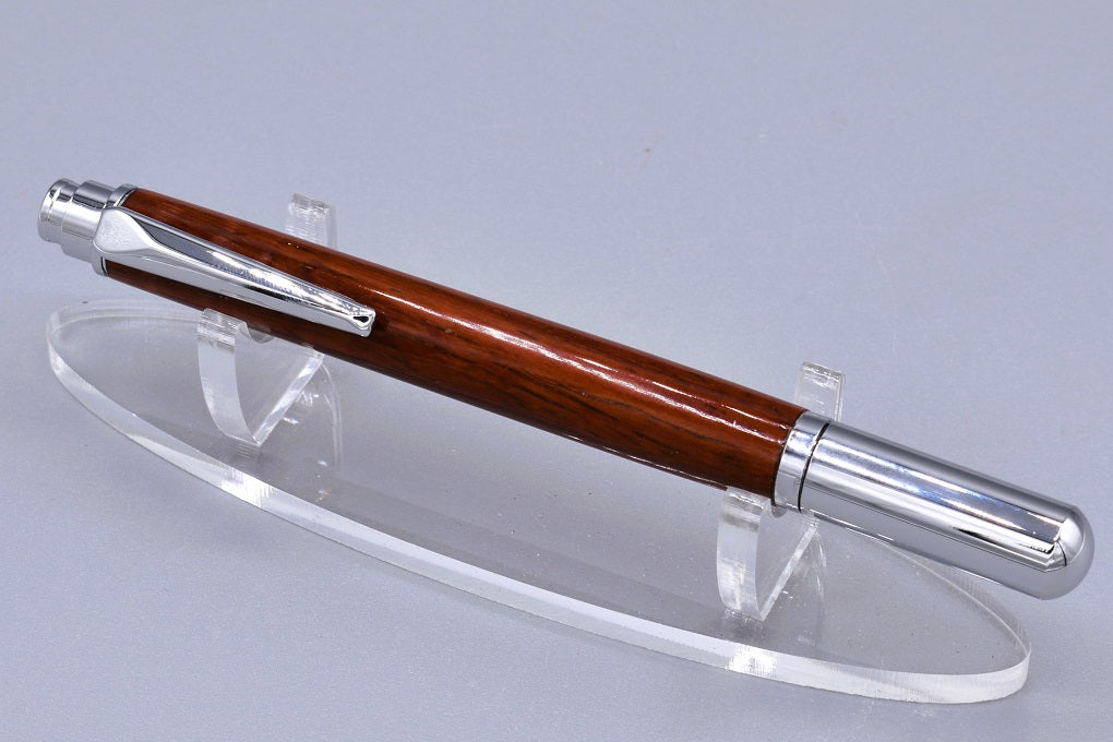 Handmade Chrome capped rollerball pen. Padauk wood.