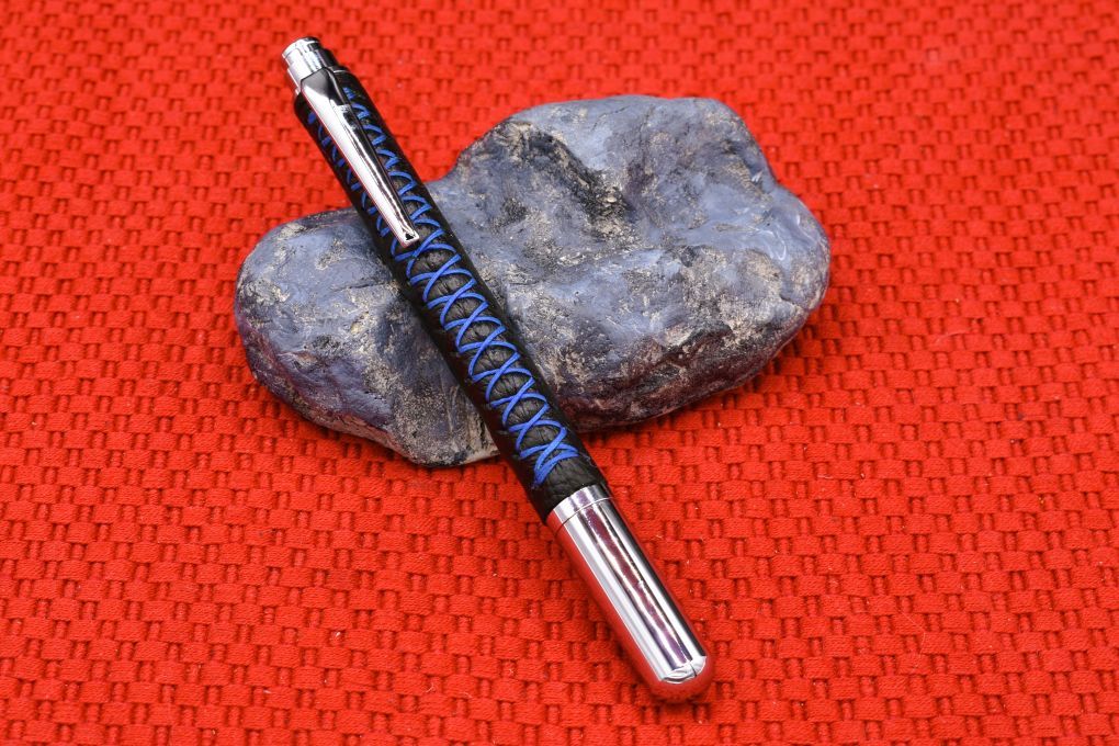 Handmade Chrome capped rollerball pen. Black Deer skin leather.