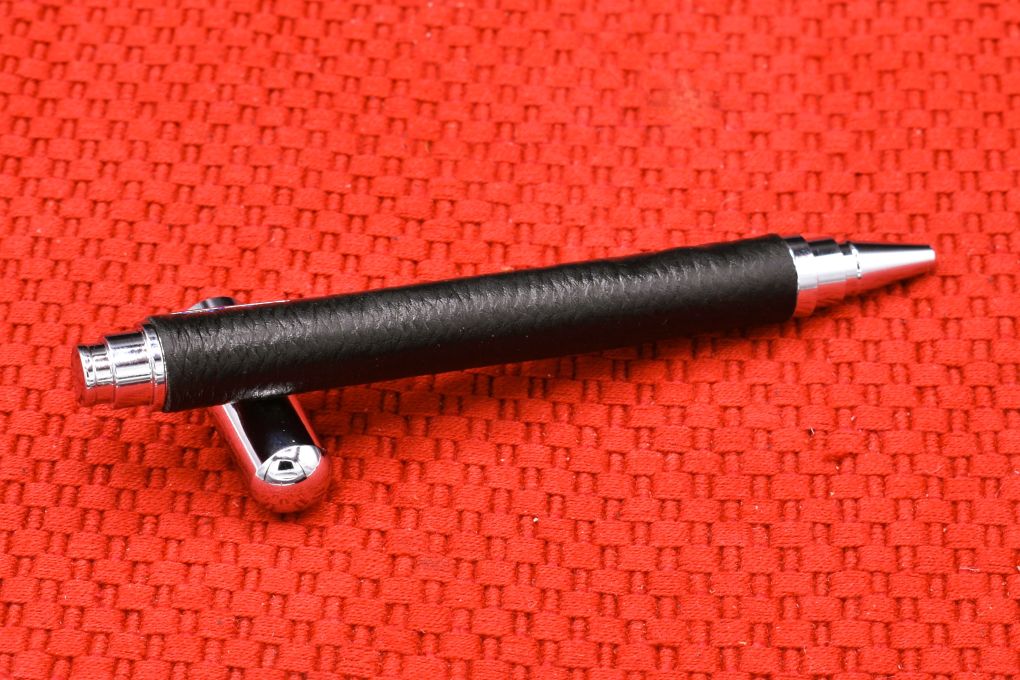 Handmade Chrome capped rollerball pen. Black Deer skin leather.