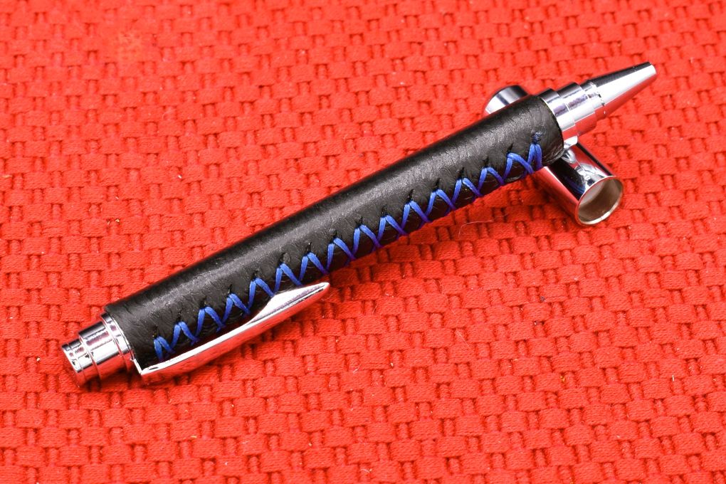 Handmade Chrome capped rollerball pen. Black Deer skin leather.