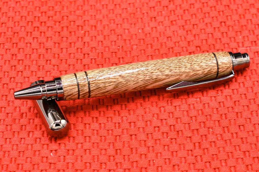 Handmade Click capped rollerball pen. Mango wood.