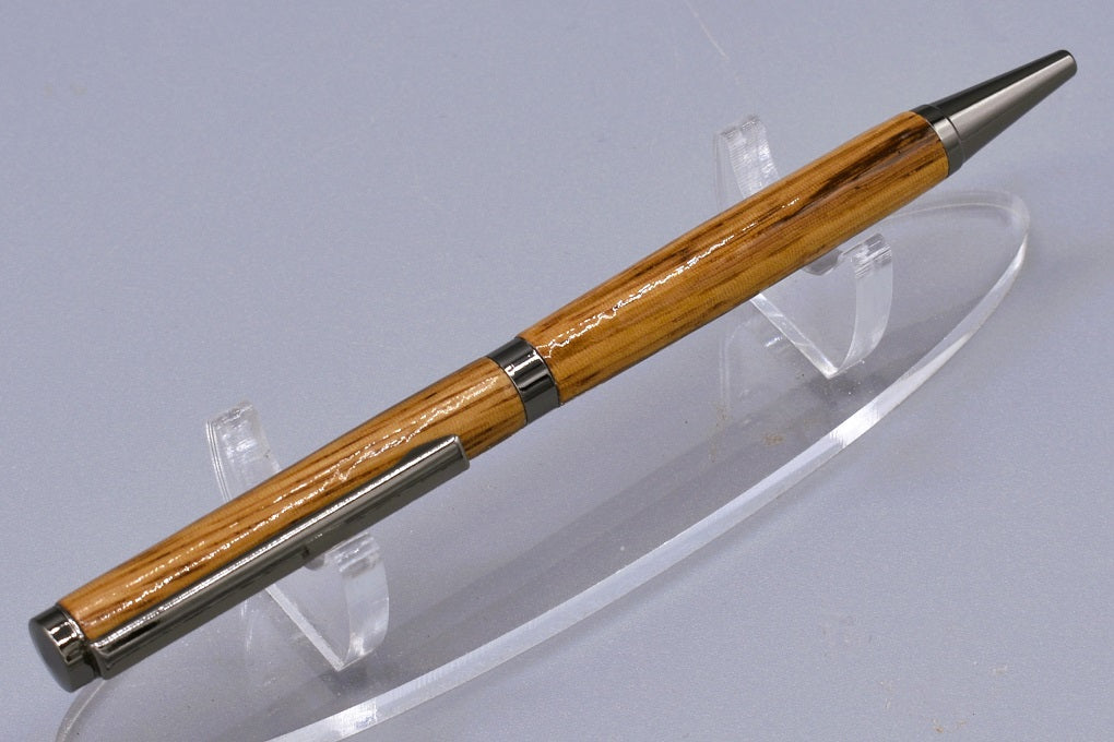 Handmade Slim twist pen. Zebra wood.