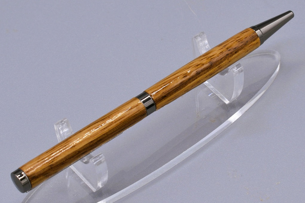 Handmade Slim twist pen. Zebra wood.