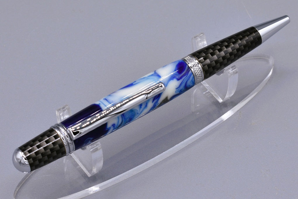 Handmade Large Carbon Fiber twist pen. Blue, white resin.