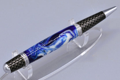 Handmade Large Carbon Fiber twist pen. Blue, white resin.